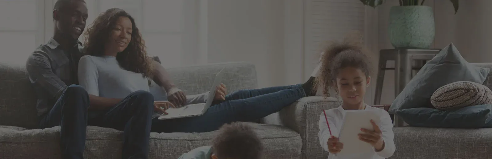 family relaxing in living room